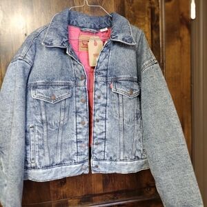 Levi's padded denim trucker jacket with a pink interior lining